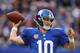 EAST RUTHERFORD, NJ - NOVEMBER 10: Eli Manning #10 of the New York Giants passes against the Oakland Raiders during their game at MetLife Stadium on November 10, 2013 in East Rutherford, New Jersey. (Photo by Al Bello/Getty Images)