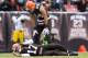 CLEVELAND, OH - NOVEMBER 24: Tight end Jordan Cameron #84 checks on quarterback Jason Campbell #17 of the Cleveland Browns who lyes on the ground after being sacked during the second half against the Pittsburgh Steelers at FirstEnergy Stadium on November
