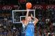 OKLAHOMA CITY, OK - NOVEMBER 18: Oklahoma City Thunder fan Cameron Rodriguez hits a halfcourt shot to win $20,000 during halftime against the Denver Nuggets on November 18, 2013 at the Chesapeake Energy Arena in Oklahoma City, Oklahoma. NOTE TO USER: Use