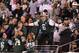 EAST RUTHERFORD, NJ - OCTOBER 08: New York Jets fan Fireman Ed Anzalone leads the fans in cheers against the Houston Texans at MetLife Stadium on October 8, 2012 in East Rutherford, New Jersey. (Photo by Alex Trautwig/Getty Images)