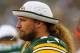 GREEN BAY, WI - AUGUST 09: Josh Sitton #71 of the Green Bay Packers watches from the sidelines as teammates take on the Arizona Cardinals at Lambeau Field on August 9, 2013 in Green Bay, Wisconsin. The Cardinals defeated the Packers 17-0. (Photo by Jona