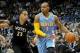 Nov 27, 2013; Minneapolis, MN, USA; Denver Nuggets guard Randy Foye (4) dribbles the ball around Minnesota Timberwolves guard Kevin Martin (23) during the first quarter at Target Center. Mandatory Credit: Brace Hemmelgarn-USA TODAY Sports