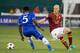 Aug 10, 2013; Washington, DC, USA; AS Roma midfielder Michael Bradley (4) loses the ball against Chelsea midfielder Michael Essien (5) during the first half at RFK Stadium. Mandatory Credit: Paul Frederiksen-USA TODAY Sports