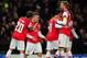 LONDON, ENGLAND - NOVEMBER 26: Mathieu Flamini of Arsenal congratulates Jack Wilshere of Arsenal on scoring his second goal during the UEFA Champions League Group F match between Arsenal and Olympique de Marseille at Emirates Stadium on November 26, 2013