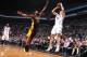 NEW YORK, NY - NOVEMBER 27: Mirza Teletovic #33 of the Brooklyn Nets shoots against Shawne Williams #3 of the Los Angeles Lakers during a game at Barclays Center on November 27, 2013 in the Brooklyn borough of New York City. NOTE TO USER: User expressly