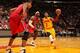 MIAMI, FL - FEBRUARY 24: Kyrie Irving #2 of the Cleveland Cavaliers drives against LeBron James #6 of the Miami Heat during a game between the Cleveland Cavaliers and the Miami Heat on February 24, 2013 at American Airlines Arena in Miami, Florida. NOTE