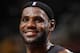 CLEVELAND, OH - NOVEMBER 27: LeBron James #6 of the Miami Heat smiles against the Cleveland Cavaliers at The Quicken Loans Arena on November 27, 2013 in Cleveland, Ohio. NOTE TO USER: User expressly acknowledges and agrees that, by downloading and/or usi