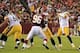 Aug 19, 2013; Landover, MD, USA; Pittsburgh Steelers quarterback Ben Roethlisberger (7) throws the ball as Washington Redskins nose tackle Barry Cofield (96) defends in the first quarter at FedEx Field. Mandatory Credit: Geoff Burke-USA TODAY Sports