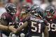 HOUSTON, TX - SEPTEMBER 29: Brooks Reed #58 of the Houston Texans celebrates with Whitney Mercilus #59, Darryl Sharpton #51 and J.J. Watt #99 after a a defensive stop at Reliant Stadium on September 29, 2013 in Houston, Texas. (Photo by Bob Levey/Getty