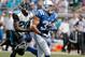 Sep 29, 2013; Jacksonville, FL, USA; Indianapolis Colts running back Donald Brown (31) runs for 50 yards as Jacksonville Jaguars cornerback Mike Harris (20) chases him in the second quarter of their game at EverBank Field. Mandatory Credit: Phil Sears-USA