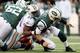 EAST RUTHERFORD, NJ - OCTOBER 28: Defensive end Cameron Wake #91 of the Miami Dolphins tackles quarterback Mark Sanchez #6 of the New York Jets at MetLife Stadium on October 28, 2012 in East Rutherford, New Jersey. (Photo by Alex Trautwig/Getty Images)
