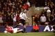 14 Apr 1999: Ryan Giggs of Manchester United beats the despairing lunge of Tony Adams of Arsenal to drive the ball past David Seaman to score the winner in the FA Cup Semi Final match played at Villa Park in Birmingham. Manchester United won the game 2-1