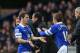 LIVERPOOL, ENGLAND - NOVEMBER 23: Leighton Baines of Everton is replaced by Gerard Deulofeu (R) during the Barclays Premier League match between Everton and Liverpool at Goodison Park on November 23, 2013 in Liverpool, England. (Photo by Alex Livesey/Ge