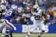 Nov 17, 2013; Orchard Park, NY, USA; New York Jets running back Bilal Powell (29) straight arms Buffalo Bills free safety Aaron Williams (23) on a run during the second half at Ralph Wilson Stadium. Bills beat the Jets 37-14. Mandatory Credit: Kevin Hoffm