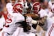 STARKVILLE, MS - NOVEMBER 16: C.J. Mosley #32 and Denzel Devall #30 of the Alabama Crimson Tide tackle Josh Robinson #34 of the Mississippi State Bulldogs at Davis Wade Stadium on November 16, 2013 in Starkville, Mississippi. (Photo by Kevin C. Cox/Gett