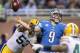 DETROIT, MI - NOVEMBER 28: Nick Perry #53 of the Green Bay Packers hits the throwing arm of Matthew Stafford #9 of the Detroit Lions causing a fumble during the second quarter of the game at Ford Field on November 28, 2013 in Detroit, Michigan. (Photo b