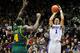 Dec 4, 2011; Evanston, IL, USA; Northwestern Wildcats guard/forward Drew Crawford (1) shoots over Baylor Bears forward Quincy Acy (4) during the first half at Welsh-Ryan Arena. Mandatory Credit: David Banks-USA TODAY Sports