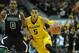 Nov 16, 2013; Kansas City, MO, USA; Missouri Tigers guard Jordan Clarkson (5) dribbles the ball as Hawaii Warriors guard Keith Shamburger (0) defends during the first half of the game at Sprint Center. Mandatory Credit: Denny Medley-USA TODAY Sports