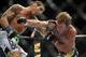Jun 22, 2012; Atlantic City, NJ, USA; Clay Guida (left) fights Gray Maynard in a lightweight bout during UFC on FX at Revel Resort and Casino. Gray Maynard won the fight by split decision in the fifth round. Mandatory Credit: Joe Camporeale-USA TODAY Spo