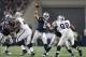 Nov 28, 2013; Arlington, TX, USA; Dallas Cowboys quarterback Tony Romo (9) throws in the pocket against the Oakland Raiders during a NFL football game on Thanksgiving at AT&T Stadium. The Cowboys beat the Raiders 31-24. Mandatory Credit: Matthew Emmons-US
