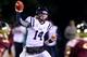 Nov 28, 2013; Starkville, MS, USA; Mississippi Rebels quarterback Bo Wallace (14) passes the ball during the game against the Mississippi State Bulldogs at Davis Wade Stadium. Mandatory Credit: Spruce Derden-USA TODAY Sports
