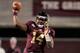 STARKVILLE, MS - NOVEMBER 28: Damian Williams #14 of the Mississippi State Bulldogs throws a pass against the Ole Miss Rebels during a game at Davis Wade Stadium on November 28, 2013 in Starkville, Mississippi. (Photo by Stacy Revere/Getty Images)
