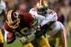 LANDOVER, MD - NOVEMBER 25: Quarterback Robert Griffin III #10 of the Washington Redskins is sacked by outside linebacker Aldon Smith #99 of the San Francisco 49ers during the third quarter at FedExField on November 25, 2013 in Landover, Maryland. (Photo