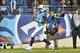 Nov 14, 2013; Nashville, TN, USA; Tennessee Titans running back Chris Johnson (28) breaks the tackle attempt by Indianapolis Colts strong safety LaRon Landry (30) (not pictured) and rushes for a touchdown during the first half at LP Field. Mandatory Credi