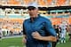 Nov 24, 2013; Miami Gardens, FL, USA; Miami Dolphins head coach Joe Philbin runs off the field after losing to Carolina Panthers 20-16 at Sun Life Stadium. Mandatory Credit: Steve Mitchell-USA TODAY Sports