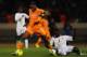 CASABLANCA, MOROCCO - NOVEMBER 16: Didier Drogba of Ivory Coast battles with Kara Mbodji of Senegal during the FIFA 2014 World Cup Qualifier Play-off Second Leg between Senegal and Ivory Coast at Stade Mohammed V on November 16, 2013 in Casablanca, Moroc