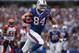 ORCHARD PARK, NY - OCTOBER 13: Scott Chandler #84 of the Buffalo Bills runs the ball in for a touchdown after making a reception during NFL game action against the Cincinnati Bengals at Ralph Wilson Stadium on October 13, 2013 in Orchard Park, New York. (