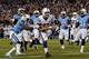 NASHVILLE, TN - NOVEMBER 14: Quarterback Andrew Luck #12 of the Indianapolis Colts scores a rushing touchdown against the Tennessee Titans at LP Field on November 14, 2013 in Nashville, Tennessee. (Photo by Frederick Breedon/Getty Images)