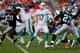 MIAMI GARDENS, FL - NOVEMBER 24: Ryan Tannehill #17 of the Miami Dolphins looks to pass the ball against the Carolina Panthers at Sun Life Stadium on November 24, 2013 in Miami Gardens, Florida. (Photo by Chris Trotman/Getty Images)