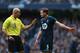 MANCHESTER, ENGLAND - NOVEMBER 24: Jan Vertonghen of Tottenham Hotspur is spoken to by referee Howard Webb during the Barclays Premier League match between Manchester City and Tottenham Hotspur at Etihad Stadium on November 24, 2013 in Manchester, Englan