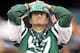 EAST RUTHERFORD, NJ - OCTOBER 28: A New York Jets fans watches the final minutes of the game against the Miami Dolphins on October 28, 2012 at MetLife Stadium in East Rutherford, New Jersey.The Miami Dolphins defeated the New York Jets 30-9. (Photo by E