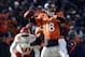 Dec 30 2012; Denver, CO, USA; Denver Broncos quarterback Peyton Manning (18) prepares to pass in the first quarter against the Kansas City Chiefs at Sports Authority Field. Mandatory Credit: Ron Chenoy-USA TODAY Sports