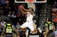 KANSAS CITY, MO - MARCH 14: Marcus Smart #33 of the Oklahoma State Cowboys performs a reverse dunk during the quarterfinal game of the 2013 Men's Big 12 Championships against the Baylor Bears at Sprint Center on March 14, 2013 in Kansas City, Missouri.