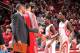 HOUSTON, TX - NOVEMBER 23: Aaron Brooks #0, Patrick Beverley #2, Dwight Howard #12 and Chandler Parsons #25 of the Houston Rockets walk off the court during the game against the Minnesota Timberwolves on November 23, 2013 at the Toyota Center in Houston,