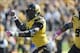 Oct 19, 2013; Columbia, MO, USA; Missouri Tigers defensive lineman Michael Sam (52) celebrates after sacking Florida Gators quarterback Tyler Murphy (3) (not pictured) during the second half at Faurot Field. Missouri won 36-17. Mandatory Credit: Denny Med