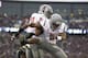 SEATTLE, WA - NOVEMBER 29: Rickey Galvin #5, left, of Washington State celebrates a touchdown reception with teammate Dom Williams #80 of Washington State during the first half of a game against the University of Washington at Husky Stadium on November 29