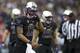 SEATTLE, WA - NOVEMBER 29: Keith Price #17 of Washington walks off the field after the Washington offense was unable to convert a third down during the first half of a game at Husky Stadium on November 29, 2013 in Seattle, Washington. (Photo by Stephen Br