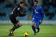 GETAFE, SPAIN - NOVEMBER 29: Pedro Lopez (L) of Levante UD competes for the ball with Sergio Escudero (R) of Getafe CF during the La Liga match between Getafe CF and Levante UD at Coliseum Alfonso Perez on November 29, 2013 in Getafe, Spain. (Photo by Go