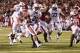 FAYETTEVILLE, AR - NOVEMBER 2: Tre Mason #21 of the Auburn Tigers rushes for a touchdown during a game against the Arkansas Razorbacks at Razorback Stadium on November 2, 2013 in Fayetteville, Arkansas. The Tigers defeated the Razorbacks 35-17. (Photo