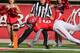 SALT LAKE CITY, UT - OCTOBER 12: Dres Anderson #6 of the Utah Utes dives into the end sone after catching a pass during the first half of an NCAA football game against the Stanford Cardinal October 12, 2013 at Rice Eccles Stadium in Salt Lake City, Utah.