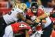 Nov 21, 2013; Atlanta, GA, USA; Atlanta Falcons quarterback Matt Ryan (2) is sacked by New Orleans Saints defensive end Keyunta Dawson (55) and defensive end Akiem Hicks (76) in the second half at the Georgia Dome. The Saints won 17-13. Mandatory Credit: