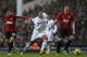 LONDON, ENGLAND - JANUARY 20: Shinji Kagawa of Manchester United and Mousa Dembele of Tottenham Hotspur battle for the ball during the Barclays Premier League match between Tottenham Hotspur and Manchester United at White Hart Lane on January 20, 2013 in