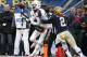PITTSBURGH, PA - NOVEMBER 29: K'Waun Williams #2 of the Pittsburgh Panthers breaks up a pass to Allen Hurns #1 of the Miami Hurricanes during the game on November 29, 2013 at Heinz Field in Pittsburgh, Pennsylvania. (Photo by Justin K. Aller/Getty Image