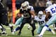 NEW ORLEANS, LA - NOVEMBER 10: Running back Pierre Thomas #23 of the New Orleans Saints runs the ball against the Dallas Cowboys during a game at the Mercedes-Benz Superdome on November 10, 2013 in New Orleans, Louisiana. (Photo by Ronald Martinez/Getty