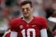 TUSCALOOSA, AL - NOVEMBER 23: AJ McCarron #10 of the Alabama Crimson Tide reacts in the final minutes of their 49-0 over the Chattanooga Mocs at Bryant-Denny Stadium on November 23, 2013 in Tuscaloosa, Alabama. (Photo by Kevin C. Cox/Getty Images)