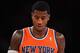 NEW YORK, NY - NOVEMBER 16: Iman Shumpert #21 of the New York Knicks looks on during the first half against the Atlanta Hawks at Madison Square Garden on November 16, 2013 in New York City. The Hawks defeat the Knicks 110-90. NOTE TO USER: User expressly